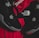 Black athletic shoes are placed alongside red and black sportswear bearing logos from Spalding and The North Face.