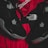 Black athletic shoes are placed alongside red and black sportswear bearing logos from Spalding and The North Face.